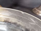a close up of a metal pan with water in it