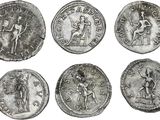 six pièces de monnaie romaines antiques, dont l'une représente une femme