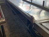 an image of a commercial kitchen with stainless steel counter tops