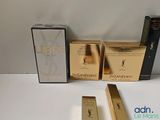 three boxes of yves saint laurent lipsticks and a box of yves saint laurent lipstick