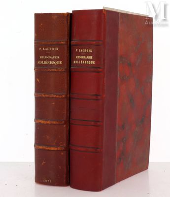 two books sitting next to each other on a table
