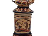 an image of a decorative tea pot on a stand on a white background