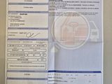 une photo d'un ticket de caisse sur lequel figure l'image d'une voiture