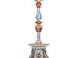 an image of a tall blue and red candle holder on a white background