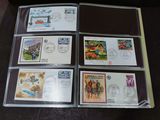 many different stamps in a folder on the table