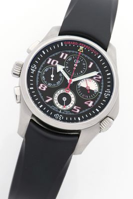 the watch is black with a red second hand and a white second hand