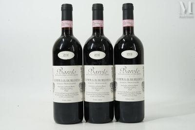 three bottles of wine sitting on top of a white table