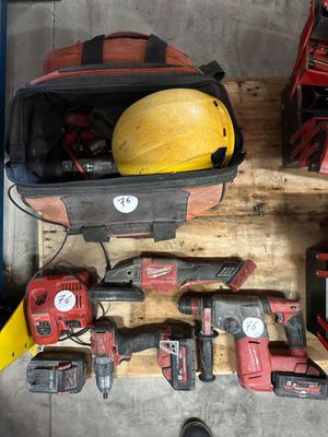 a lot of tools that are sitting on a pallet