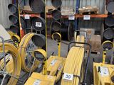 many different types of hoses in a warehouse