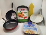 many different pans and pans on the counter