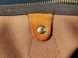 a close up of a purse with a zipper on it