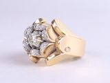 an image of a gold ring with diamonds on a white background