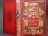 la couverture et le dos d'un livre rouge aux bords dorés