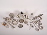 a lot of silver objects that are on the table