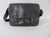 black leather messenger bag on white background