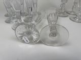 a lot of empty wine glasses sitting on a table