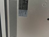 an open laptop computer sitting on top of a white table