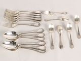 a lot of spoons and spoon spoons on the table