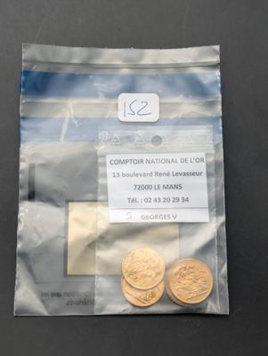 a bag with two coins and a sticker on it