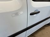 a white car with a sticker on the side of it