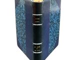a book that is open with a book in it