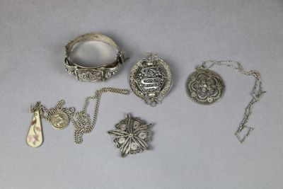 a lot of silver items that are on the table