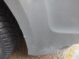 a close up of a tire on a car ' s rim