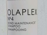 une photo d'un flacon de shampoing d'entretien Olaplex n° 4