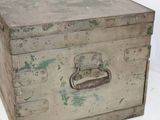 an old wooden box with a metal latch on it
