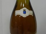 a bottle of wine that is sitting on a table