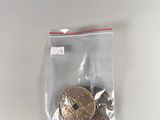 a picture of a coin in a bag on a table
