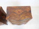 a small wooden table with a drawer on it