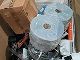 a cardboard box filled with toilet paper and toilet paper rolls