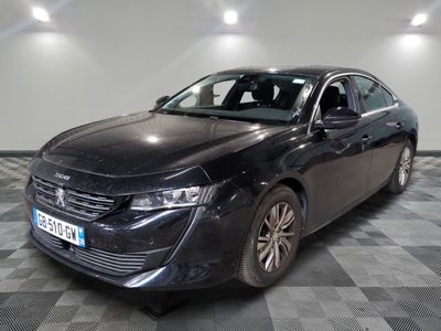 a picture of a black car parked in a garage