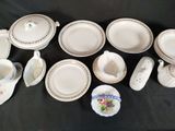 a lot of plates and cups on the table