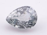a close up of a diamond on a white surface