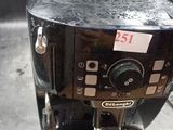 a coffee machine that is sitting on a table