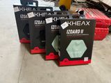 three boxes of khexa headphones are sitting on the floor