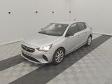a picture of a white car parked in a garage