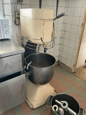 an image of a kitchen with a mixer and other appliances