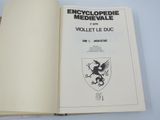 an open book with a picture of a dragon on it