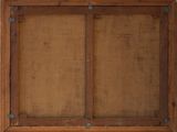 an image of a wooden frame with a picture hanging on the wall