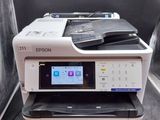 a printer that is sitting on top of a printer