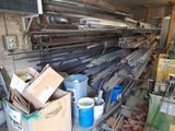 many different types of metal pipes and pipes in this garage