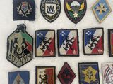 some of the patches are laid out on a white surface