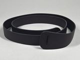 a close up of a black belt on a white surface