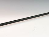 a long stick with a handle on a white surface
