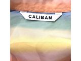 a close up of a label on the back of a shirt