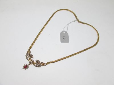 a close up of a necklace with a tag on it
