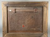 an old picture of a wooden frame with a red button on it